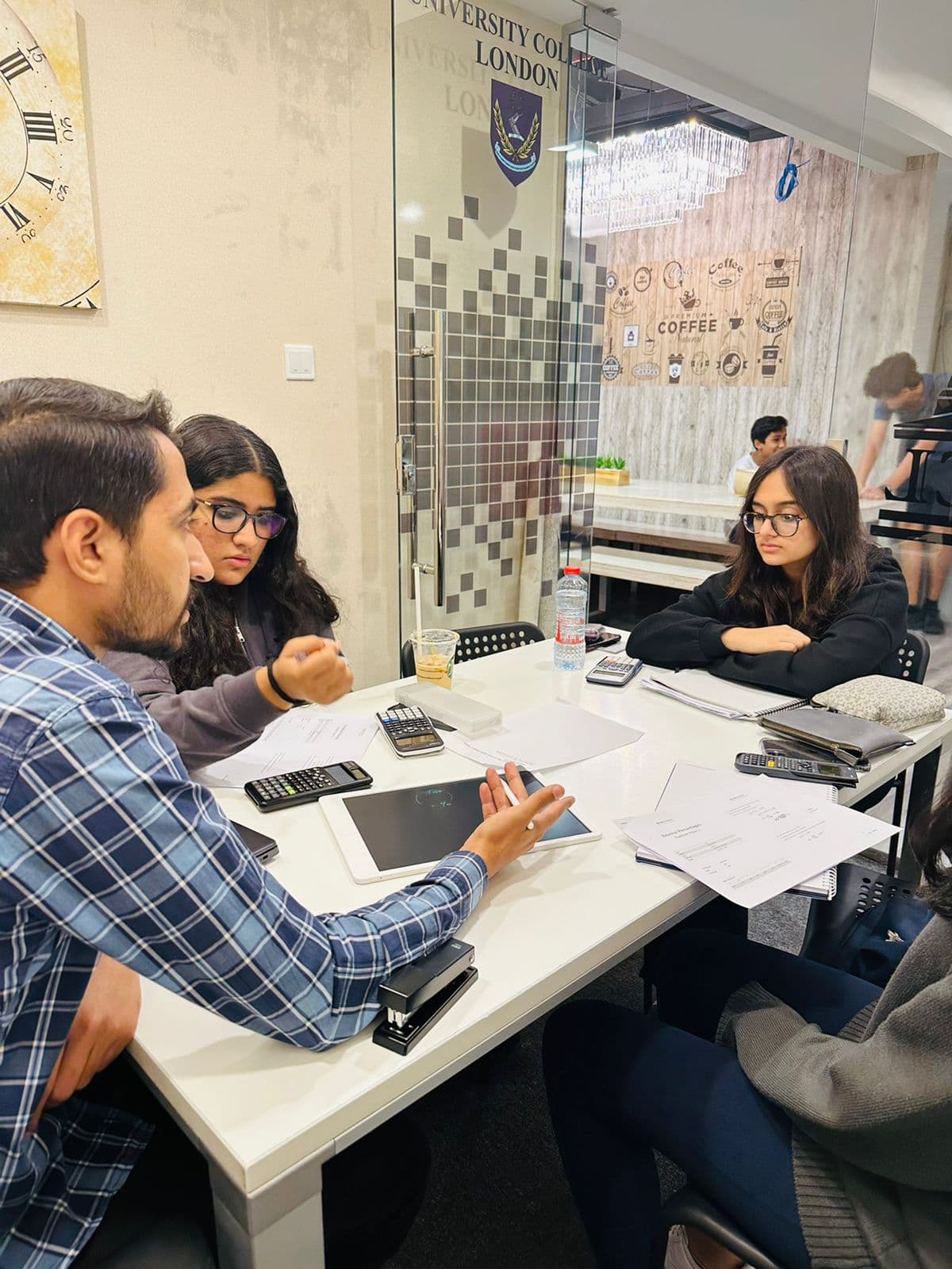 Small group maths session with students and tutor
