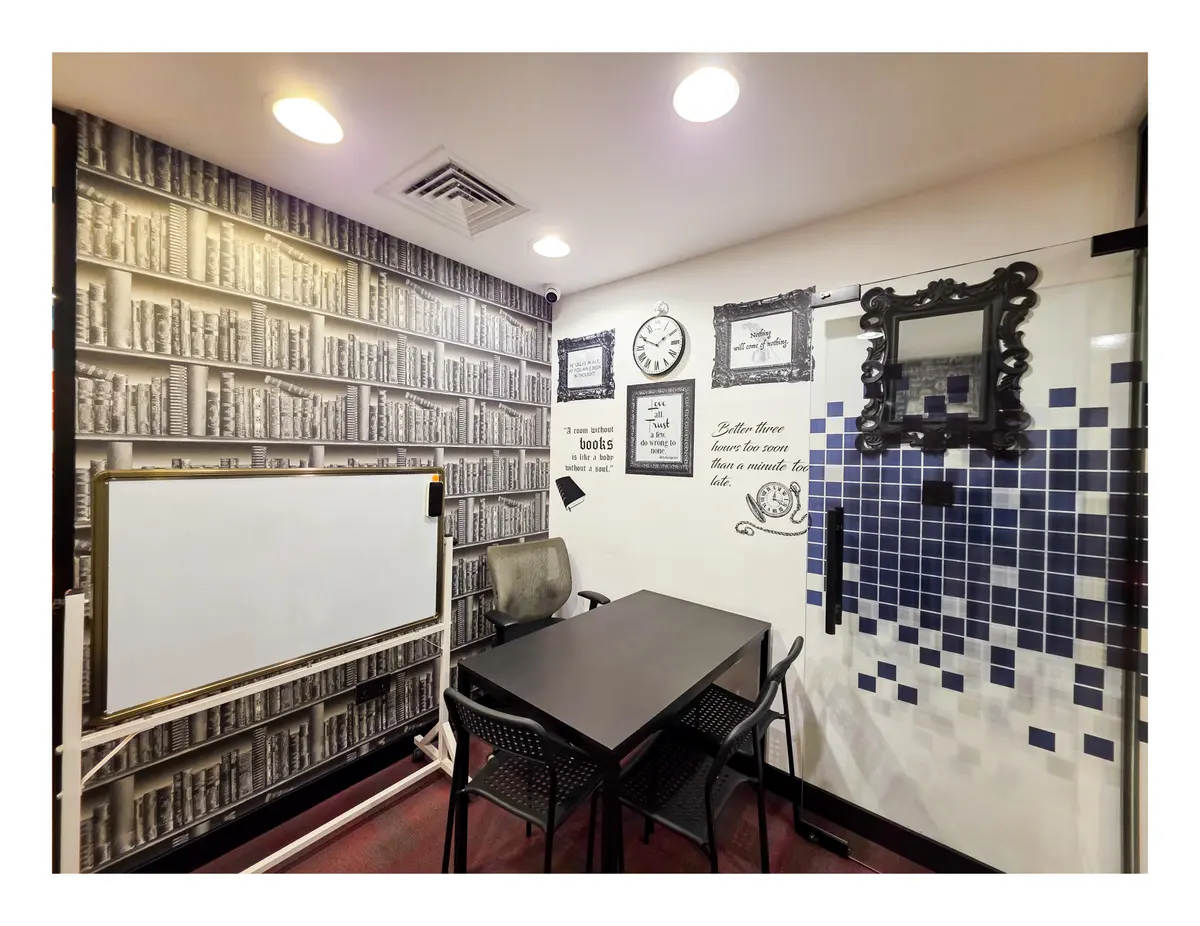 Oxford library themed classroom with whiteboard at Improve ME Institute