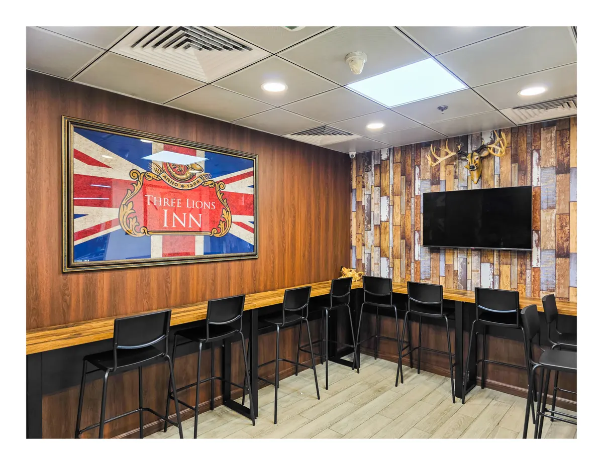 UK pub themed pantry with Union Jack artwork at Improve ME Institute