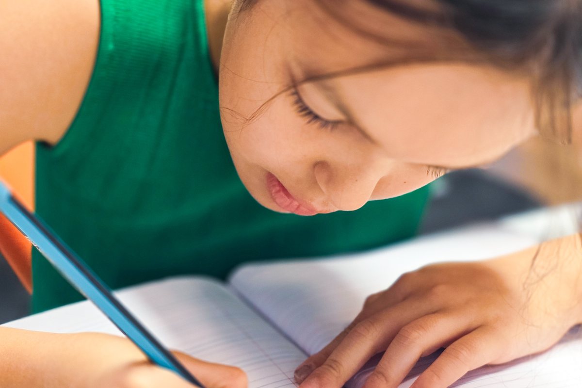 Thinking child surrounded by creative education and learning icons